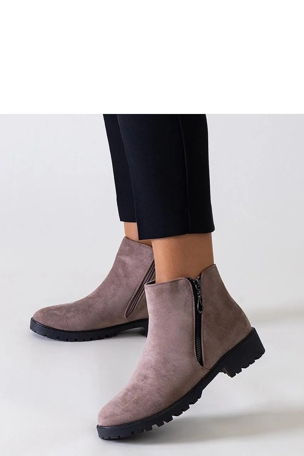 Brown ankle boots with metal inserts