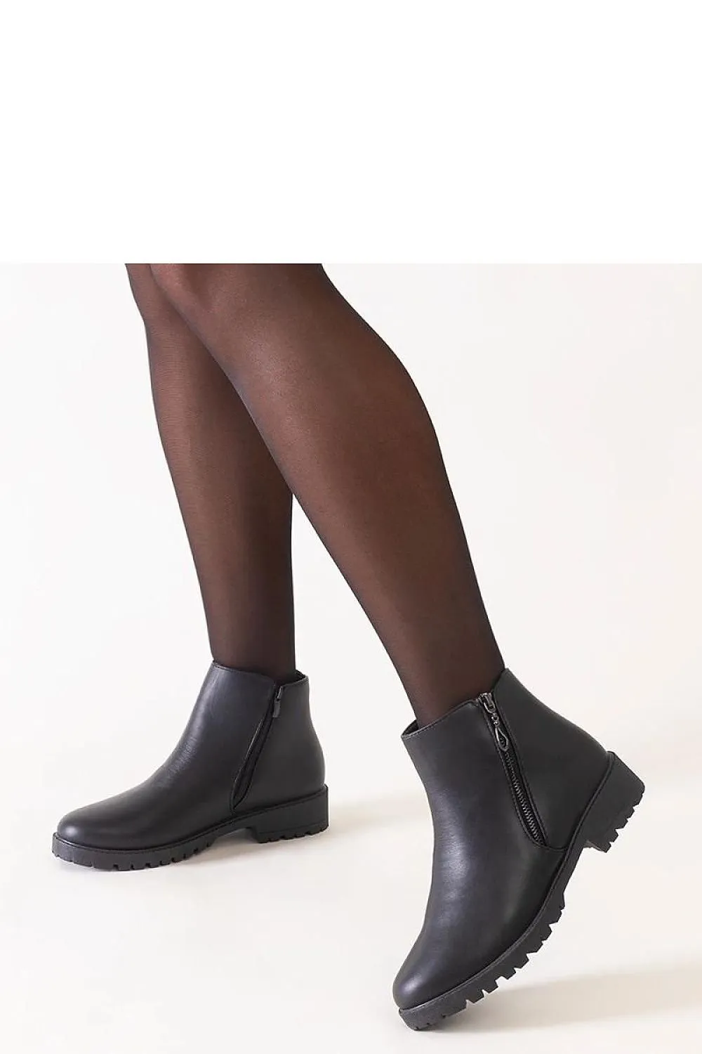 Brown ankle boots with metal inserts