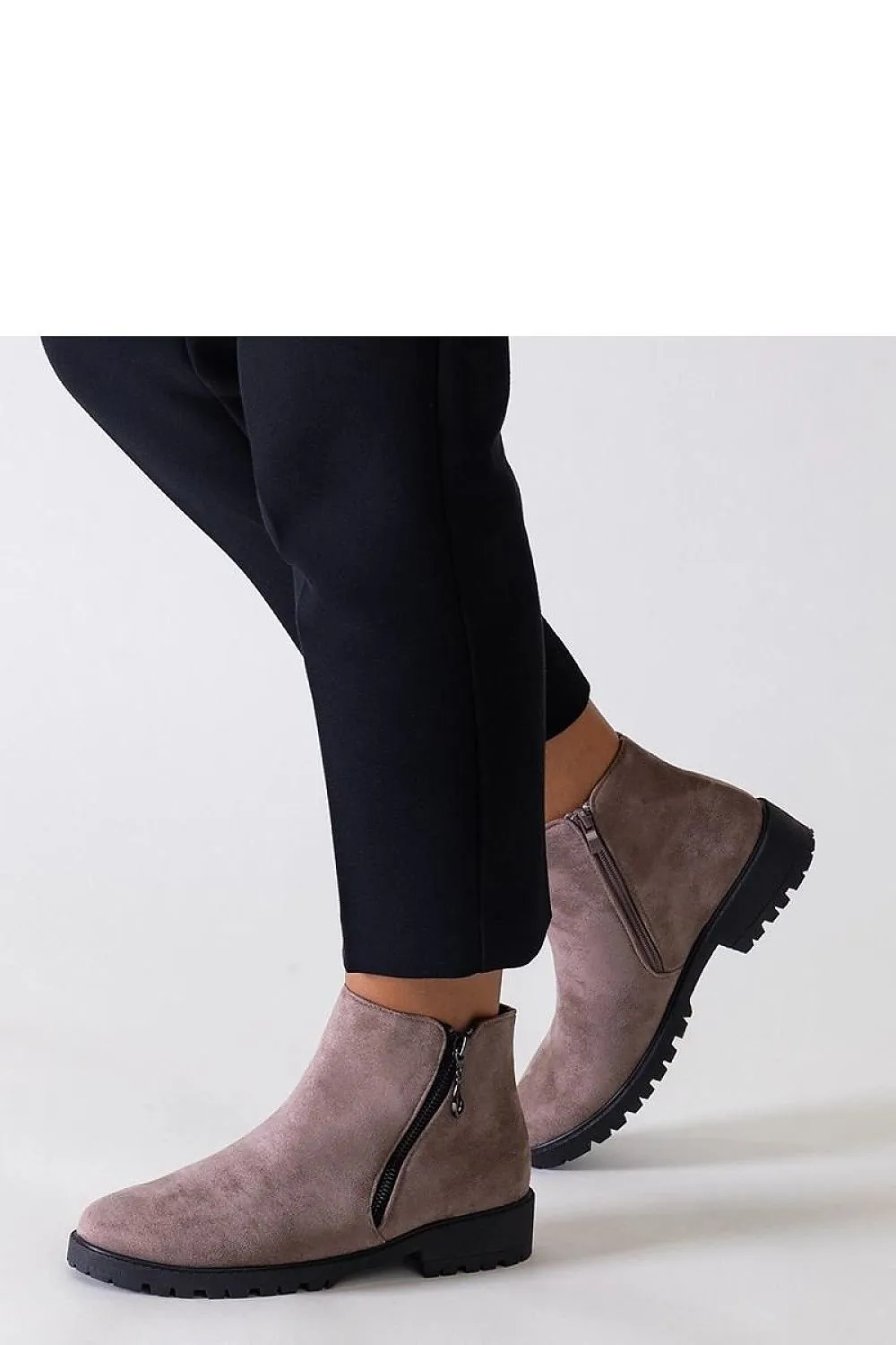 Brown ankle boots with metal inserts