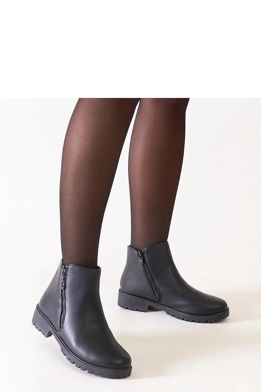 Brown ankle boots with metal inserts